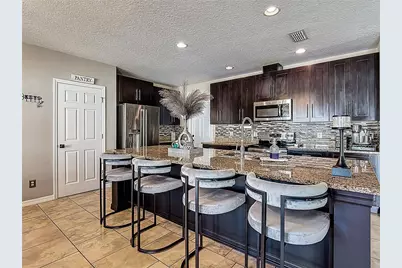 4711 Greycliff Prairie Drive, Kissimmee, FL 34758 - Photo 18