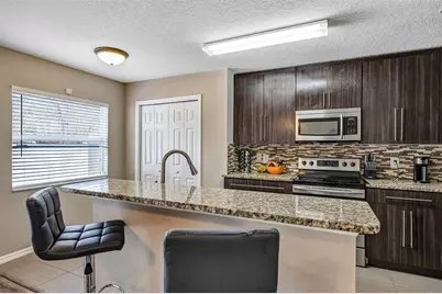 688 Cresting Oak Circle #48, Orlando, FL 32824 - Photo 8