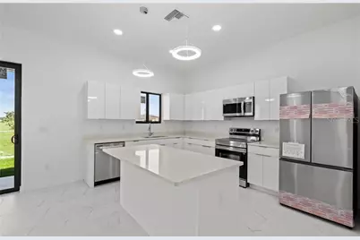 3927 NW 40th Terrace, Cape Coral, FL 33993 - Photo 8