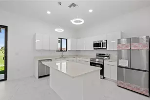 3927 NW 40th Terrace, Cape Coral, FL 33993 - Photo 8