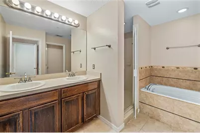 9434 Silver Buttonwood Street, Orlando, FL 32832 - Photo 12