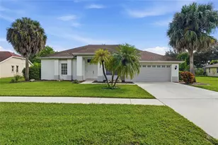 571 Chamonix Ave S, Lehigh Acres, FL 33974 - Photo 1