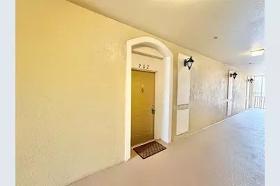 3326 Robert Trent Jones Drive #202, Orlando, FL 32835 - Photo 2