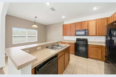 2838 Sweetspire Circle, Kissimmee, FL 34746 - Photo 16