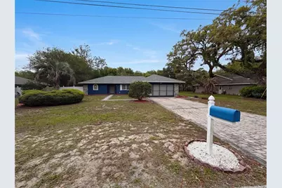 7650 Holiday Drive, Spring Hill, FL 34606 - Photo 1