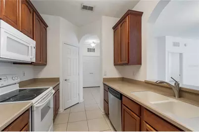 3326 Robert Trent Jones Drive #305, Orlando, FL 32835 - Photo 4