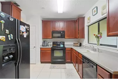 6113 Apollos Corner Way, Orlando, FL 32829 - Photo 22