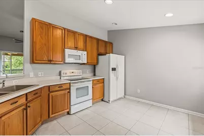 6440 Axeitos Terrace #108, Orlando, FL 32835 - Photo 14