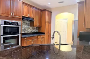 6935 Brescia Way, Orlando, FL 32819 - Photo 10