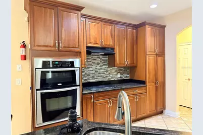 6935 Brescia Way, Orlando, FL 32819 - Photo 22