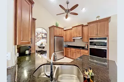 6977 Dolce Street, Orlando, FL 32819 - Photo 18