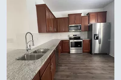 3723 Seneca Club Loop #31-102, Orlando, FL 32808 - Photo 4