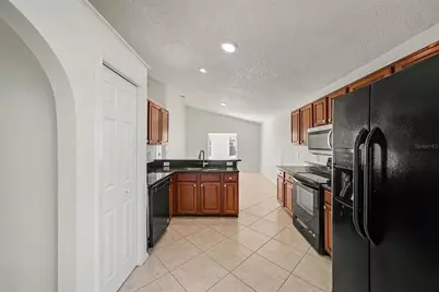 11040 NW Fairhaven Way, Orlando, FL 32825 - Photo 8