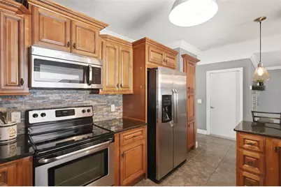 8509 Sandberry Boulevard, Orlando, FL 32819 - Photo 12