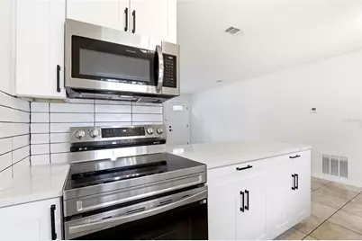 5465 Lescot Lane, Orlando, FL 32811 - Photo 12