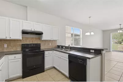 949 Whispering Cypress Lane, Orlando, FL 32824 - Photo 4