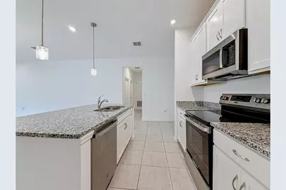 418 Quayside Avenue, Mascotte, FL 34753 - Photo 8