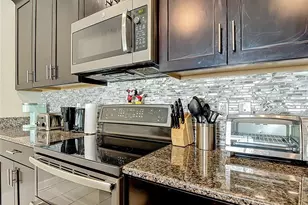 9077 Dogleg Dr, Champions Gate, FL 33896 - Photo 12