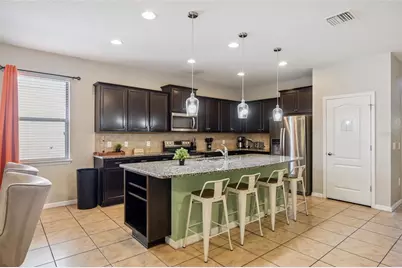 8875 Qin Loop, Kissimmee, FL 34747 - Photo 10