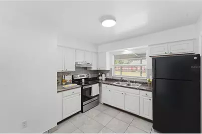2213 Villano Avenue, Orlando, FL 32818 - Photo 10