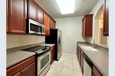 3338 Robert Trent Jones Drive #210, Orlando, FL 32835 - Photo 4