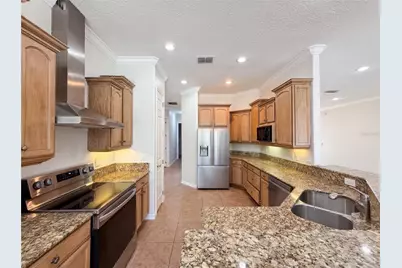 10408 Lago Louisa Court, Clermont, FL 34711 - Photo 8