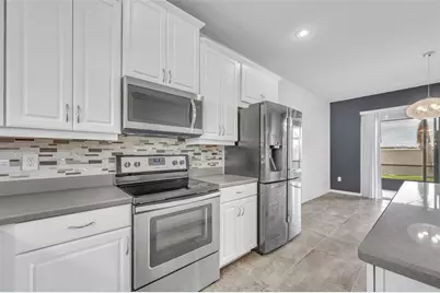 2548 Nouveau Way, Kissimmee, FL 34741 - Photo 16