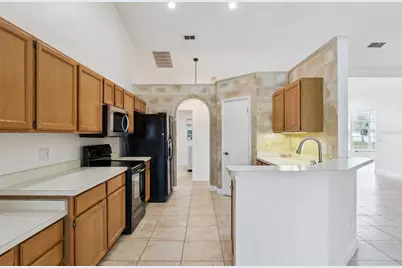 12879 Lower River Boulevard, Orlando, FL 32828 - Photo 14