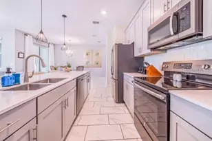 8977 Cabot Cliffs Dr, Champions Gate, FL 33896 - Photo 14