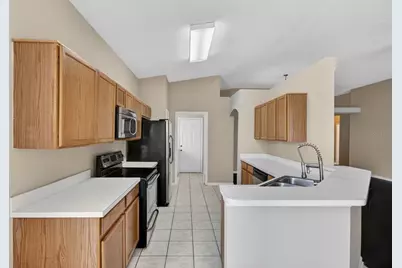7246 Mardell Court, Orlando, FL 32835 - Photo 12