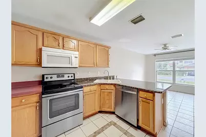 5306 Grove Crossings Boulevard, Orlando, FL 32839 - Photo 18