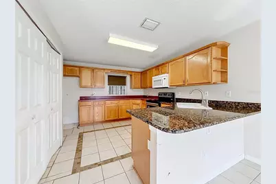 5306 Grove Crossings Boulevard, Orlando, FL 32839 - Photo 16