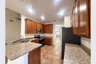 6984 Brescia Way, Orlando, FL 32819 - Photo 8