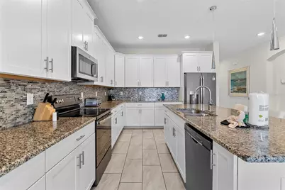 1559 Flange Drive, Champions Gate, FL 33896 - Photo 8