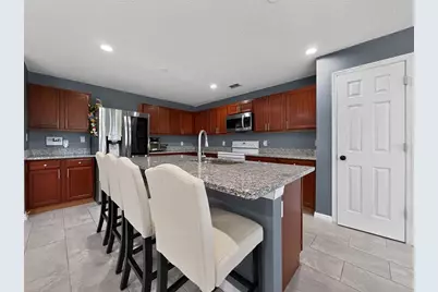7821 Falabella Court, Orlando, FL 32818 - Photo 12