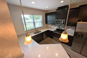 11451 Crowned Sparrow Ln, Tampa, FL 33626 - Photo 6