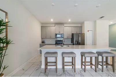 388 Ocean Course Avenue, Champions Gate, FL 33896 - Photo 10