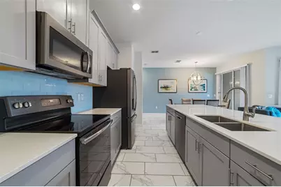 388 Ocean Course Avenue, Champions Gate, FL 33896 - Photo 8