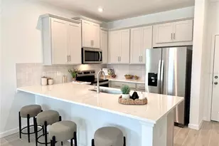 9928 Red Canoe Aly, Orlando, FL 32832 - Photo 6