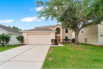 30131 Rattana Court, Wesley Chapel, FL 33545 - Photo 1