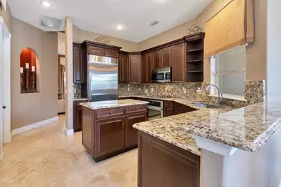 7718 Debeaubien Drive, Orlando, FL 32835 - Photo 18