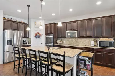 9189 Busaco Park Way, Winter Garden, FL 34787 - Photo 20