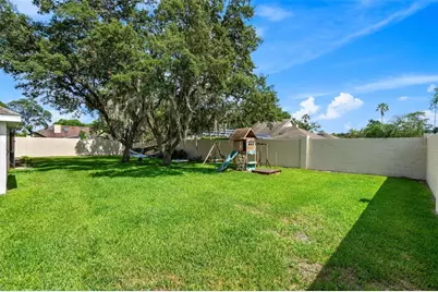 4513 Woodlands Village Drive, Orlando, FL 32835 - Photo 26