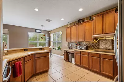 2849 Curving Oaks Way, Orlando, FL 32820 - Photo 12