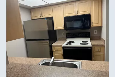 6142 Peregrine Avenue #13D, Orlando, FL 32819 - Photo 4