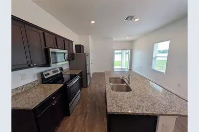 34933 Daisy Meadow Loop, Zephyrhills, FL 33541 - Photo 6