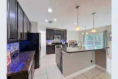10672 Cabbage Tree Loop, Orlando, FL 32825 - Photo 20