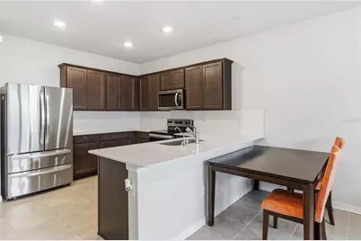 6910 Reverie Park Ave Street, Orlando, FL 32829 - Photo 10