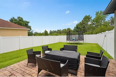 2438 Wild Tamarind Boulevard, Orlando, FL 32828 - Photo 38