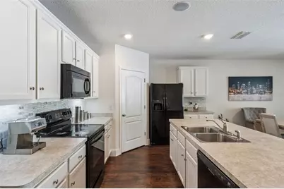 5946 Churchill Sq Way, Groveland, FL 34736 - Photo 12